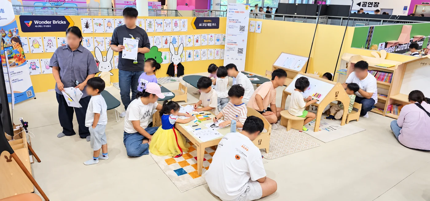 Families coloring together at Wonder Bricks