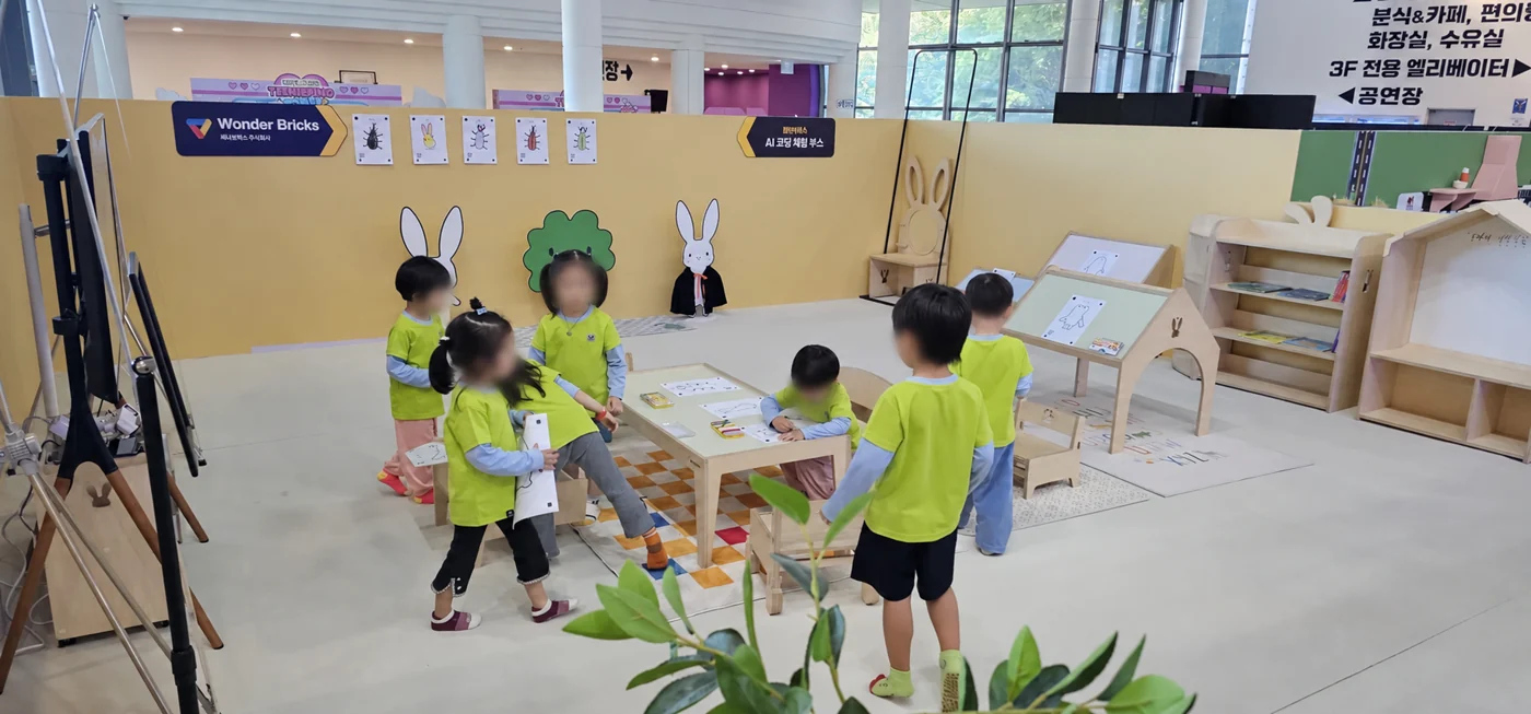 Children enjoying a group experience at Wonder Bricks