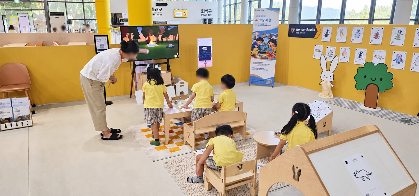 Children enjoying a group experience at Wonder Bricks